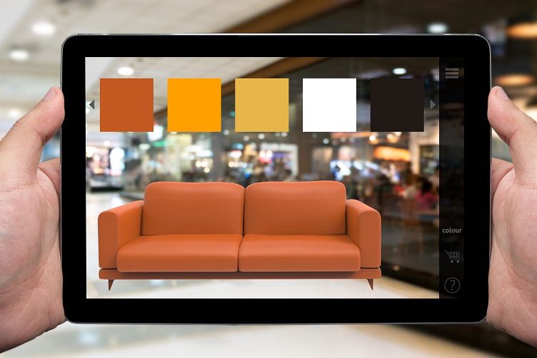 Person Using AR App to Customize a Couch